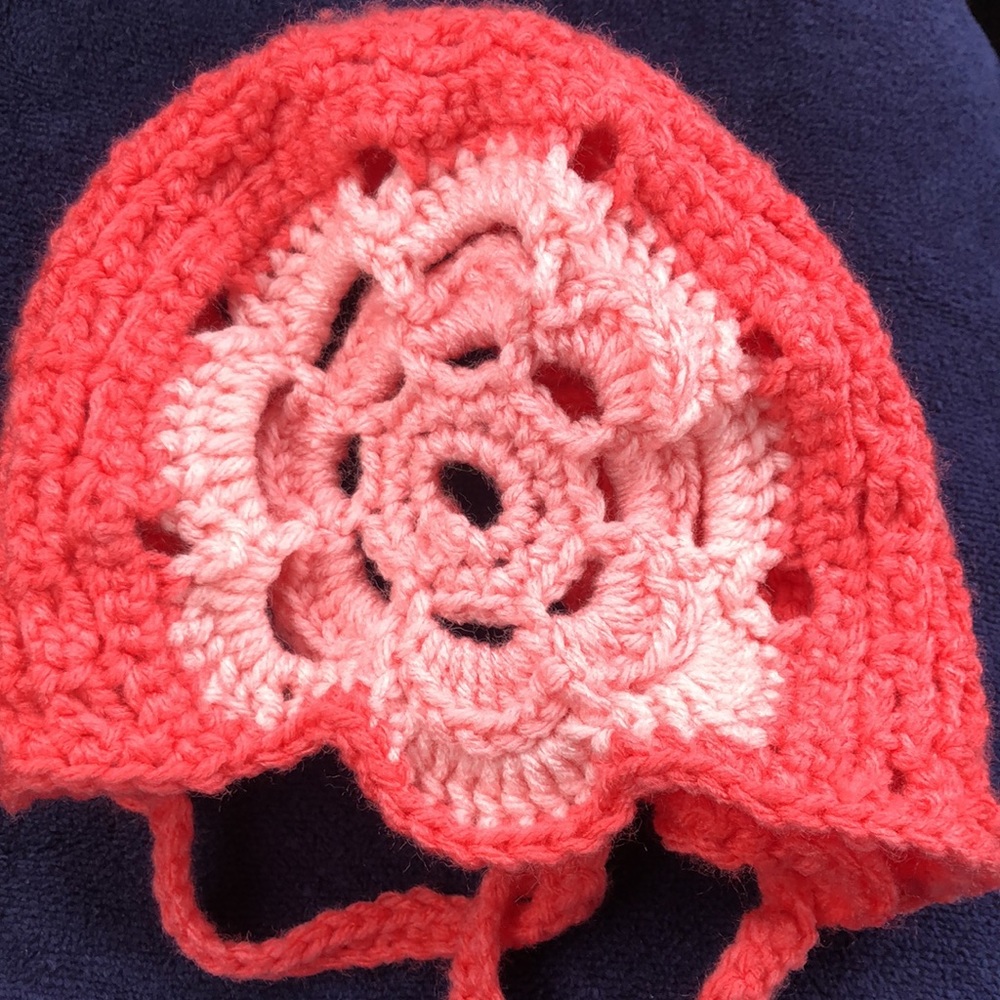 Hand knit bonnet for baby girl